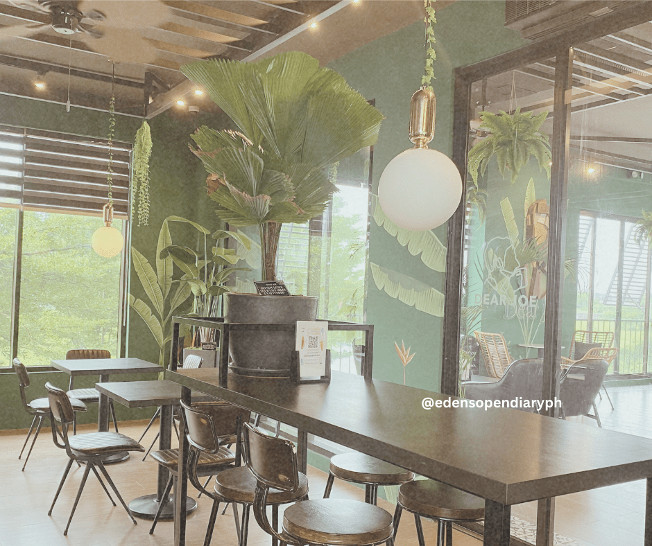 Dear Joe seating by large windows
